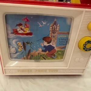 Fisher-Price Musical Toy with Red and White Accents